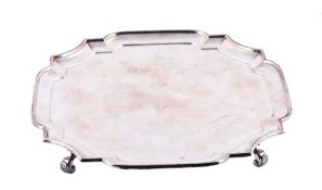 A silver shaped square salver by Goldsmiths & Silversmiths Co. Ltd A silver shaped square salver