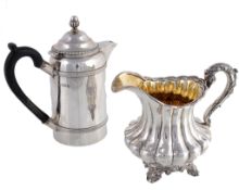 A late William IV silver lobed baluster cream jug, maker`s mark ½`, London 1837 A late William IV