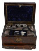 A rose wood and marquetry dressing case, opening to ten cut glass bottles... A rose wood and