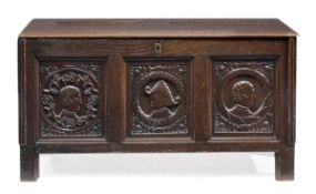 A Charles II panelled oak chest, circa 1660 and incorporating three 16th century ‘Romayne’ panels,