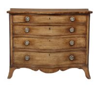 A George III serpentine fronted chest of drawers, circa 1770, the shaped top with crossbanded and