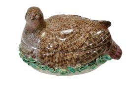 A Bow porcelain partridge tureen and cover, circa 1760, typically modelled as a bird in a nest, 14cm