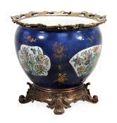 A French porcelain gilt-metal mounted Samson-type Chinese-style blue-ground jardiniere, circa