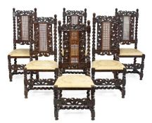 A set of six Charles II walnut dining chairs, circa 1660, each rectangular shaped back centred by