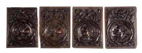 A set of four carved oak ‘Romayne’ panels, late 16th/ early 17th century, each rectangular panel