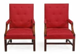 A pair of mahogany and upholstered Gainsborough armchairs in George III style, 19th century, each