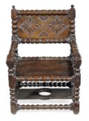 A William and Mary oak child’s chair, circa 1690, the bobbin turned frame with rectangular back