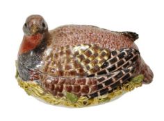 A Bow porcelain partridge tureen and cover, circa 1760, typically modelled as a bird in a nest, 14cm