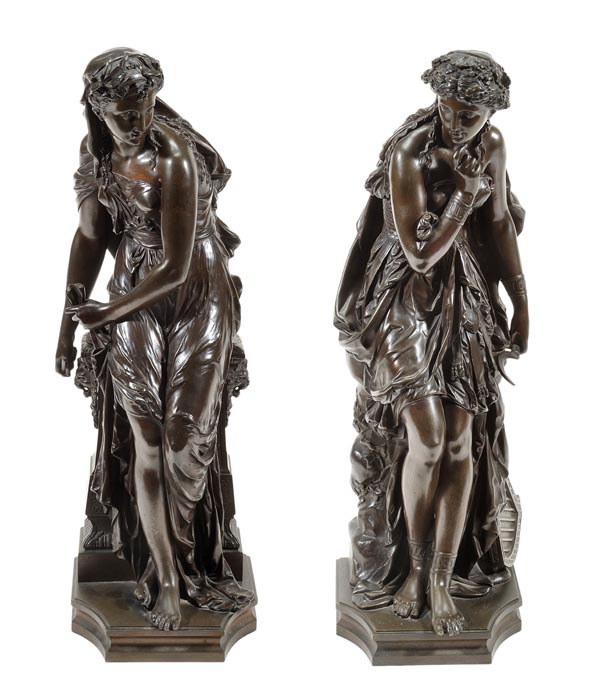 French school, late 19th century, a pair of patinated bronze models of maidens, each portrayed as