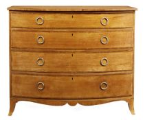 A George III satinwood bowfront chest of drawers, circa 1800, in the manner of Gillows of Lancaster,