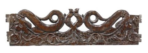 A Charles I carved oak frieze section, circa 1630, the pierced frieze incorporating twin opposing