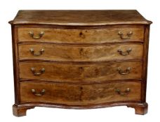 A George III mahogany serpentine dressing chest, circa 1770, the top with moulded edge, above four