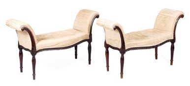 A pair of George III mahogany and upholstered window seats, circa 1770, each shaped rectangular seat