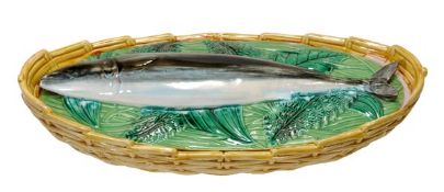 A George Jones majolica mackerel oval fish tureen and cover, circa 1871, with ochre ozier-moulded