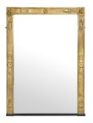 A George IV giltwood and composition wall mirror, circa 1825, the rectangular plate within a