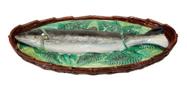 A George Jones majolica salmon oval fish tureen and cover, circa 1871, with brown ozier-moulded