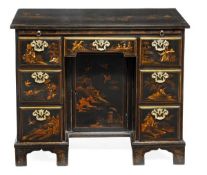 A George II black lacquer and chinoiserie decorated kneehole desk, circa 1750, decorated throughout