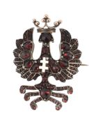 A garnet set eagle brooch, the rose cut garnet set eagle displayed A garnet set eagle brooch, the