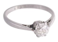 A diamond single stone ring, the old cut diamond in a six claw setting A diamond single stone ring,