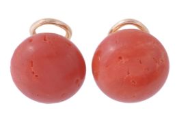 A pair of coral ear clips, set with circular cabochon coral, with clip fittings, 1.5cm diameter