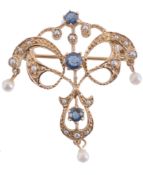 A sapphire brooch, the openwork scroll brooch set with three circular cut... A sapphire brooch, the