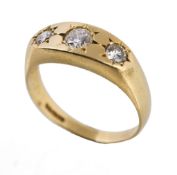 An 18 carat gold and diamond three stone ring An 18 carat gold and diamond three stone ring, set