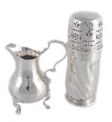 A late Victorian silver baluster cream jug, maker`s mark obscured, London 1899 A late Victorian