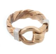 A gold coloured ring, of twisted design, finger size T, 14.5g A gold coloured ring, of twisted