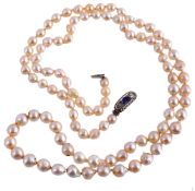 A single strand cultured pearl necklace, the ninety seven baroque shaped... A single strand