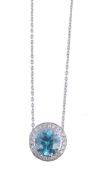 A blue zircon and diamond cluster pendant A blue zircon and diamond cluster pendant, the round cut