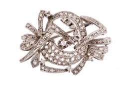 A diamond set stylised brooch, the openwork brooch set throughout with... A diamond set stylised