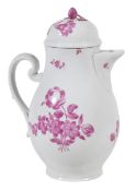 A Volkstedt coffee pot and cover of pear shape painted in puce; 22cm