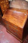 A 19th Century mahogany bureau with a fitted interior and four long drawers on bracket feet 111cm