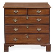 A George III mahogany chest with oak sides with two short and three long drawers 74cm high, 75cm