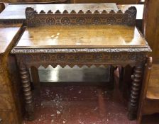 A Victorian carved oak side table, circa 1890, in 17th century taste 105cm wide