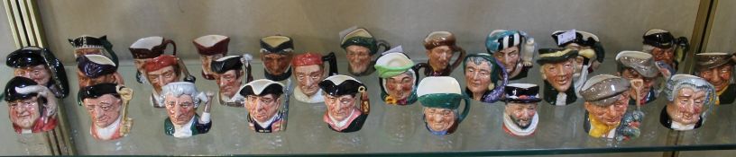 A large quantity of Royal Doulton miniature Toby jugs to include various examples from `