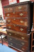 A 19th Century mahogany chest on chest with dentil moulded cornice, two short and six long drawers,
