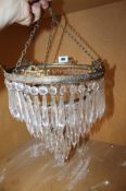 A moulded glass four tier mounted ceiling chandelier/shade