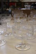 Nine Edwardian engraved glass dessert bowls