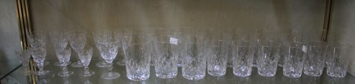 A mixed quantity of drinking glasses, the majority possibly Waterford and three Edinburgh Crystal