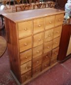 An Oriental hardwood chest of twenty short drawers 111cm high, 89cm wide