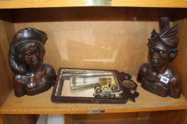 A pair 19th century French opera glasses, a small mirror, a fan and two carved hardwood busts