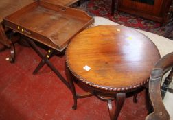 A George III style mahogany butlers tray on stand and an occasional table