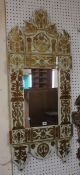 A Moorish mirror with gilt stylised decoration 122cm high, 52cm wide  Best Bid