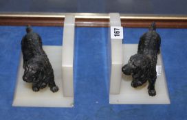 A pair of bookends modelled with bronze retrievers