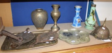 *A group of middle eastern decorative metalwares and two polychrome decorated glass bottle vases