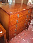 A Georgian style walnut chest of drawer 102cm high, 86cm wide, walnut cabinet and a walnut corner