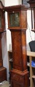 A pitch pine eight-day longcase clock, mid 19th century incorporating earlier dial, the four pillar