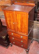 A Georgian style cabinet on chest with three drawers 121cm high, 60cm wide