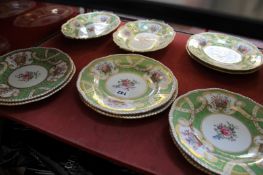 A Coalport foliate decorated part dessert service, retailer mark `T. Goode & Co.` to base